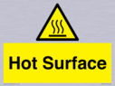 hot-surface-symbol-in-a-warning-triangle-with-black-text-on-yellow~